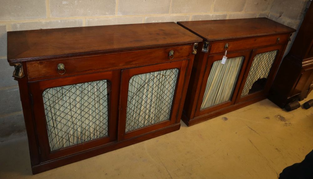 A pair of Regency design mahogany side cabinets, with applied gilt metal Egyptian motifs, W.120cm, D.39cm, H.86cm